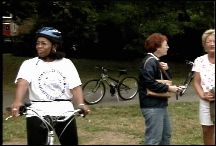 Bicyclist and Laurie Gaines Goldberg in Edgemont Park